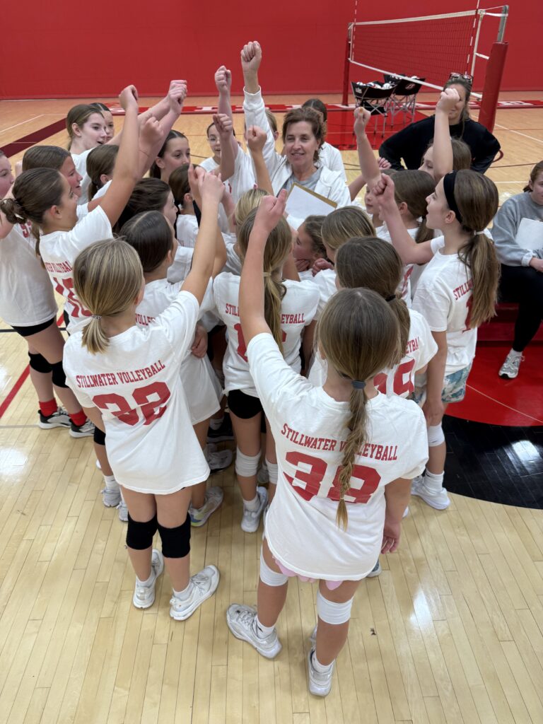 Bring it in tight!
The 12's break for water with Coach Colleen during tryouts on 11/2/2025